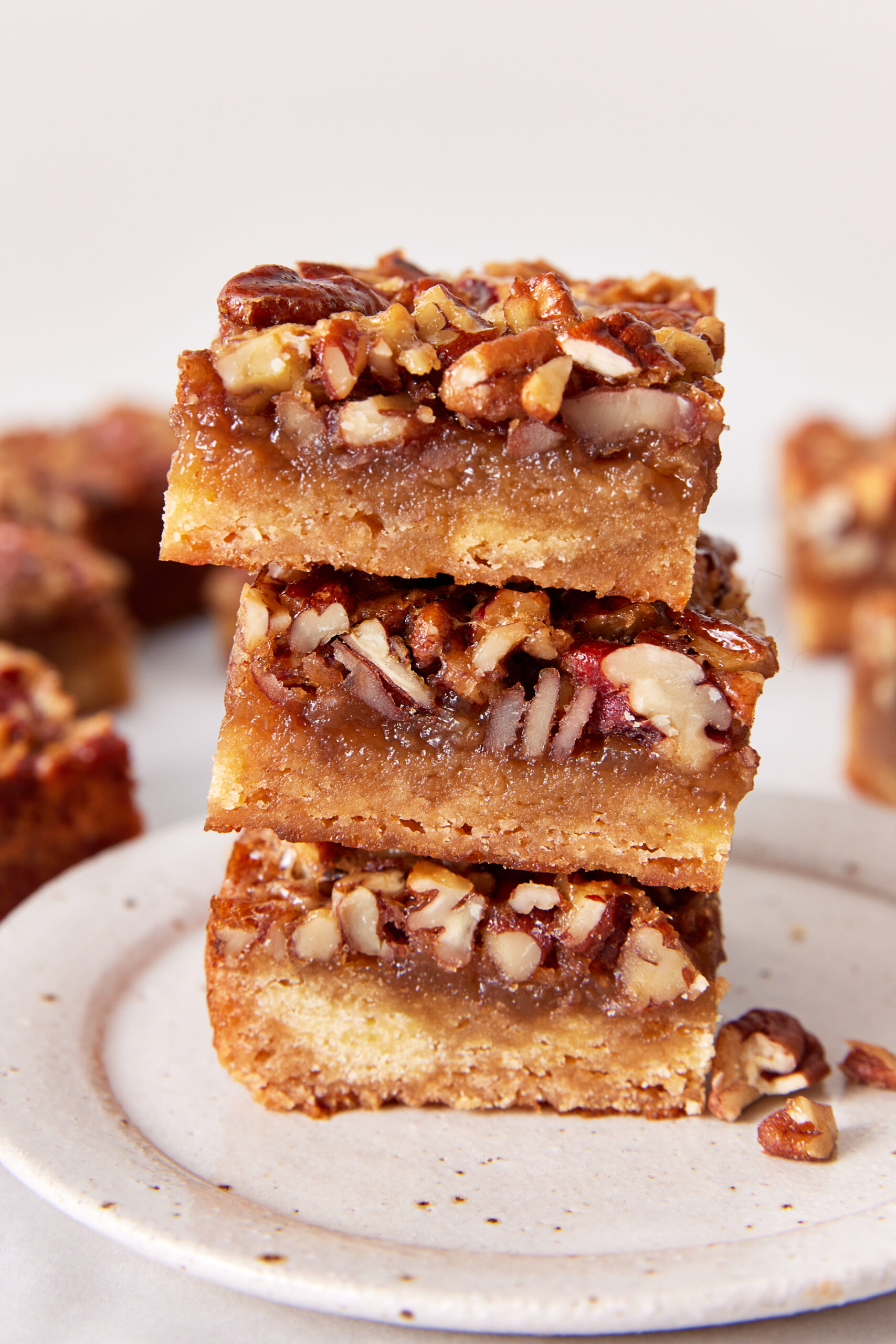 Pecan Pie Bars stacked close-up side shot