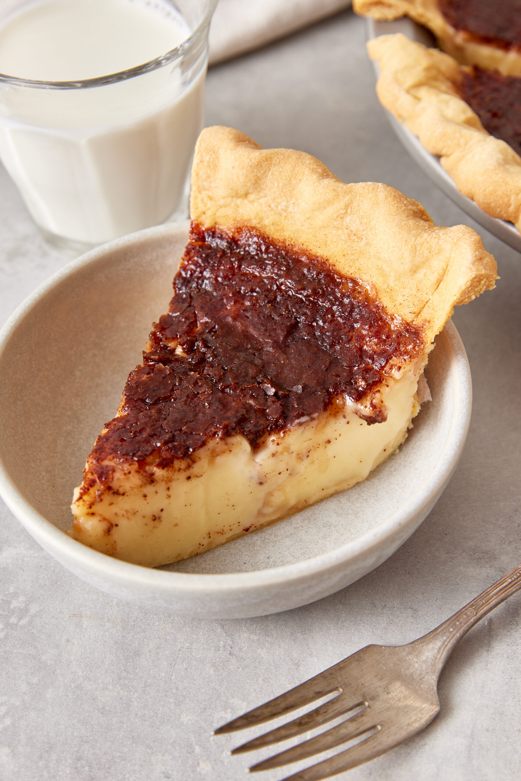 Sugar Cream Pie slice on a plate shot from diagonal