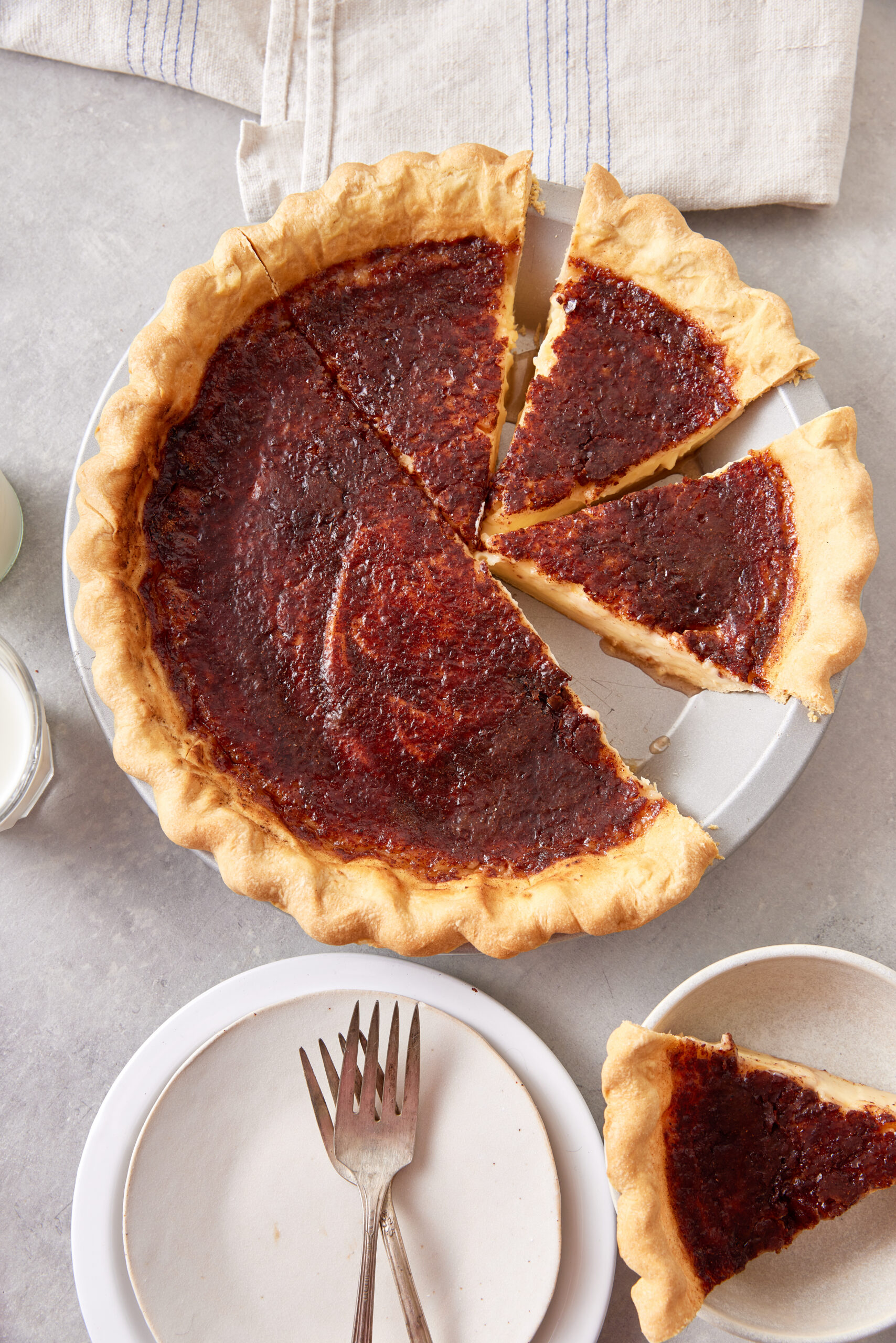 Sugar Cream Pie cut into slices on a plate shot from above